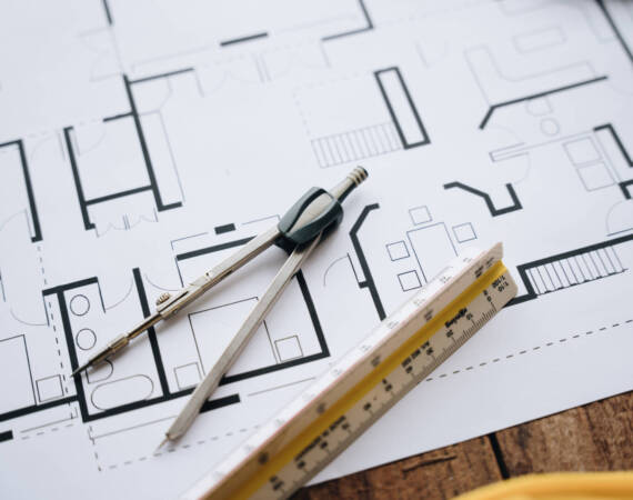 house model,blueprint,pencil and ruler on clean white background